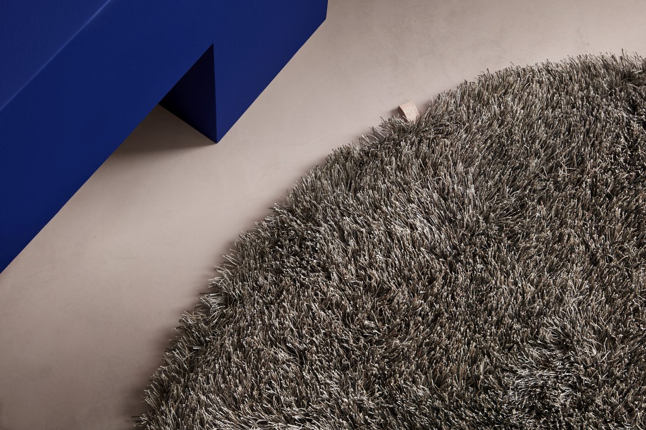 An elegant long pile rug that shimmers in a variety of shades - Fogg ...