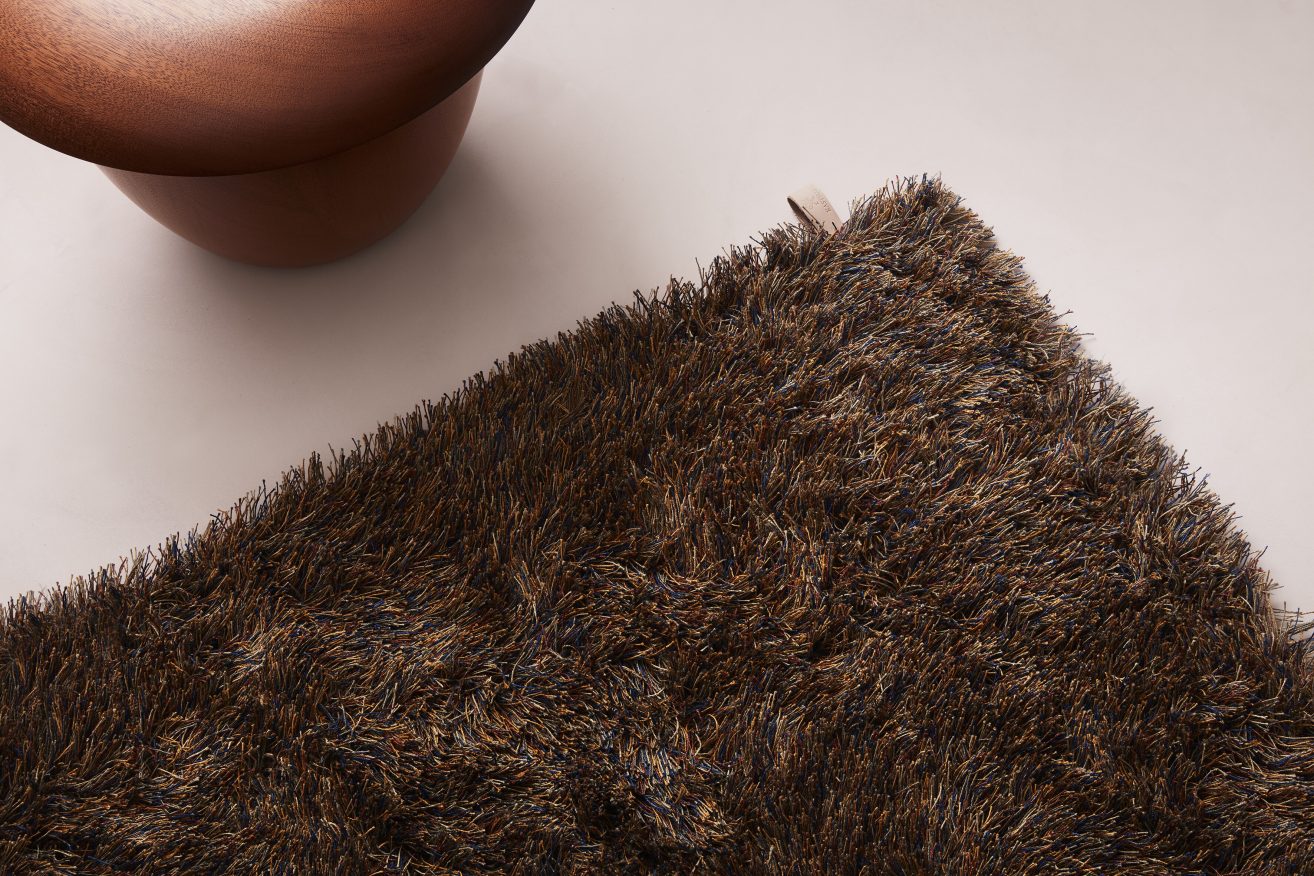 An elegant long pile rug that shimmers in a variety of shades - Fogg ...