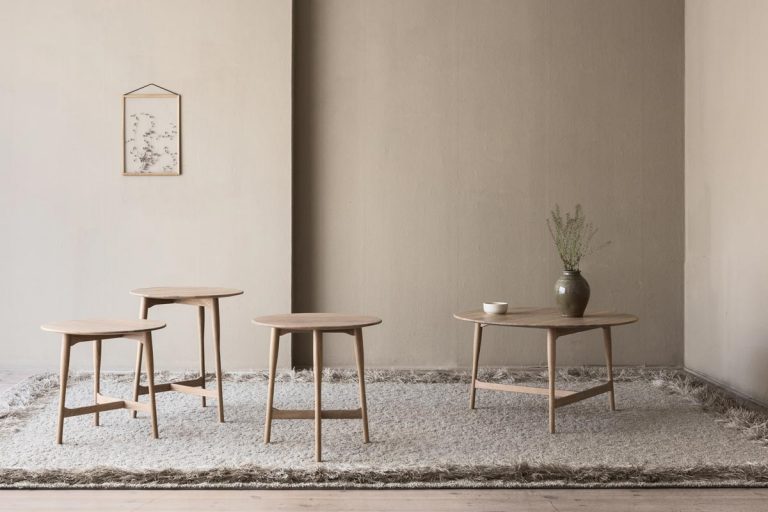 A graceful and easytoplace coffee table that offers a generous table