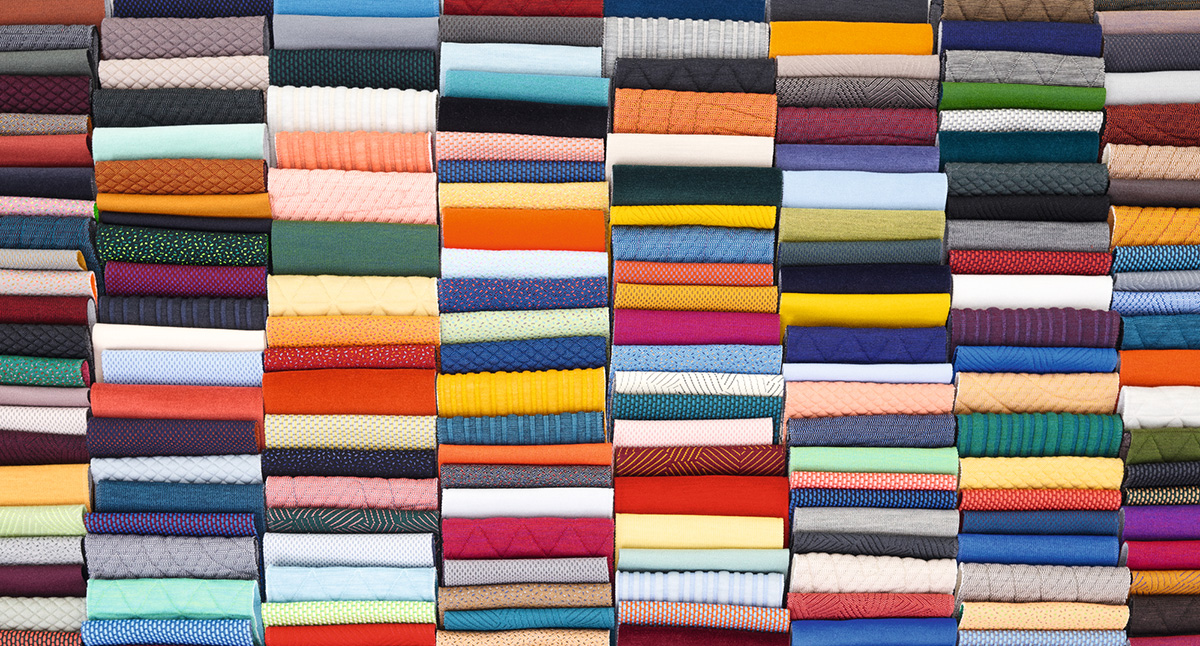 Kvadrat's premium Danish textiles showcase innovative design through vibrant colors, distinctive textures, and sustainable manufacturing.