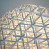 Lattice pendant lamp by Charlotte von der Lancken showing innovative 3D-printed grid pattern structure