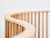 Detail Ray divider wooden slats create light patterns Indicum Inredningsarkitekter