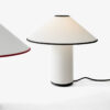 &tradition Colette table lamp featuring Art Deco inspired design with cotton-linen shade and brass details
