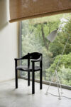 Gubi introduces new dark stained pine edition of iconic Daumiller armchair with distinctive rustic character