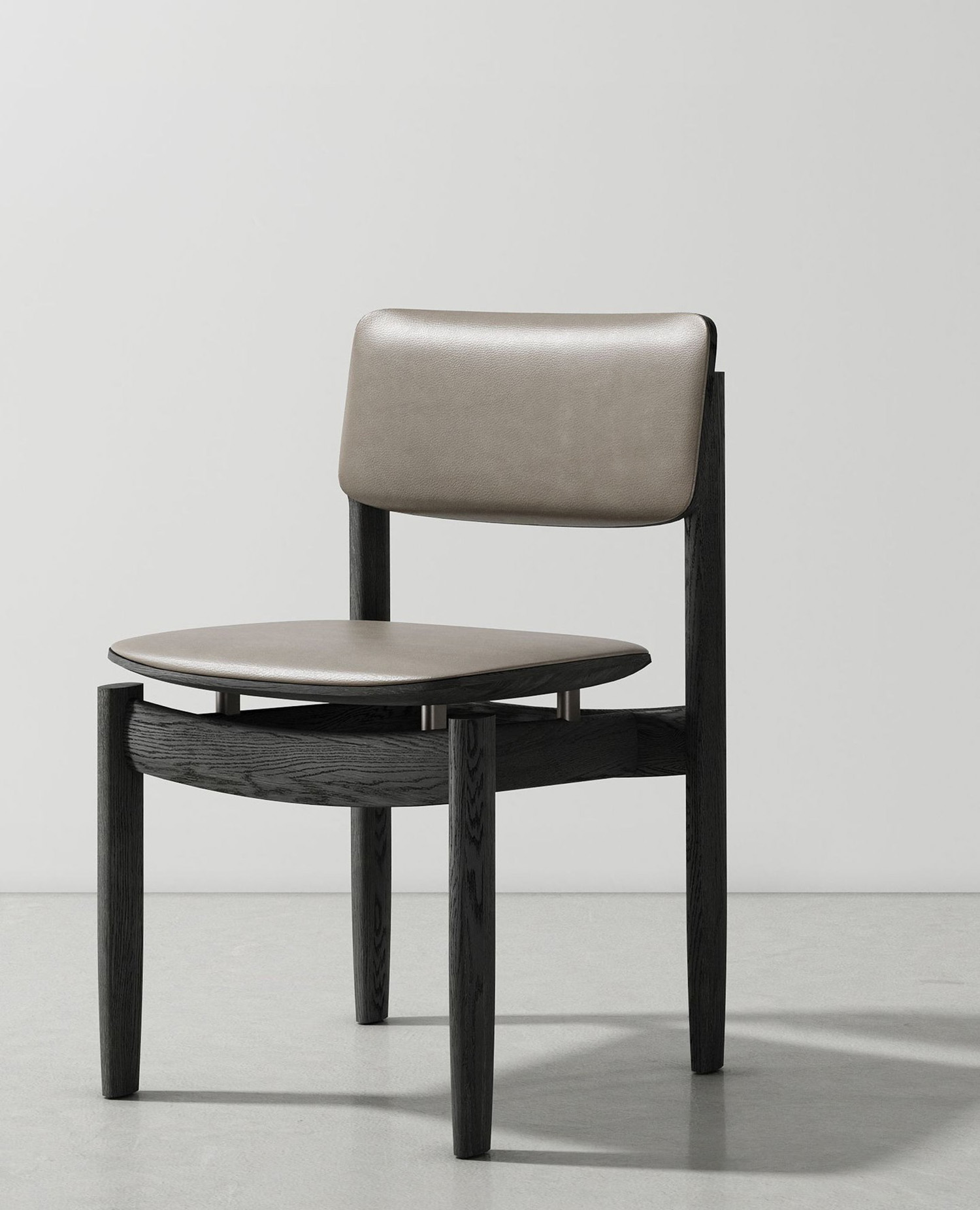 District Eight's Bow Chair highlighting the gravity-defying construction and ergonomic contours.