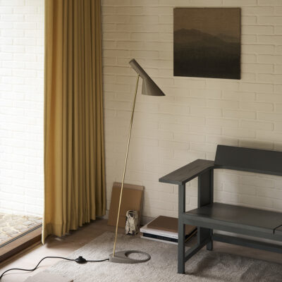 New editions of Arne Jacobsen classic lamp in black and warm grey by Louis Poulsen, featuring iconic Danish design elements
