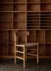 Børge Mogensen's J39 Chair Upholstered by Fredericia featuring canvas seat and solid wood frame