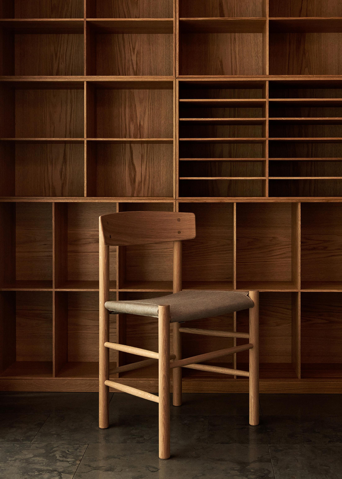 Børge Mogensen's J39 Chair Upholstered by Fredericia featuring canvas seat and solid wood frame