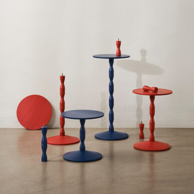 Matti Klenell's Pedestal Table in vibrant red and deep blue, showing modular height system from Design House Stockholm's new collection