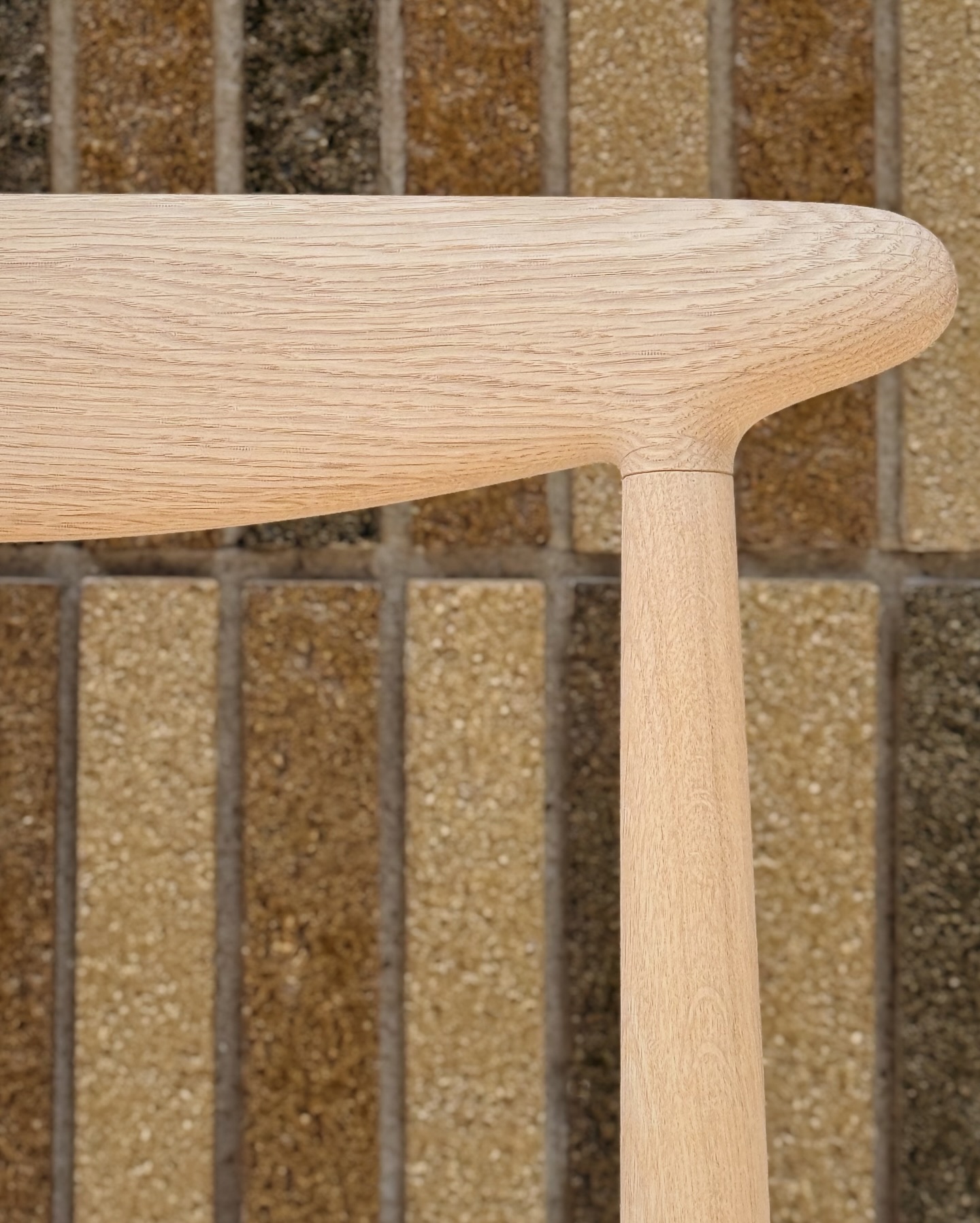 PP101 chair demonstrating Wegner's 1955 design philosophy with clean lines and traditional craftsmanship