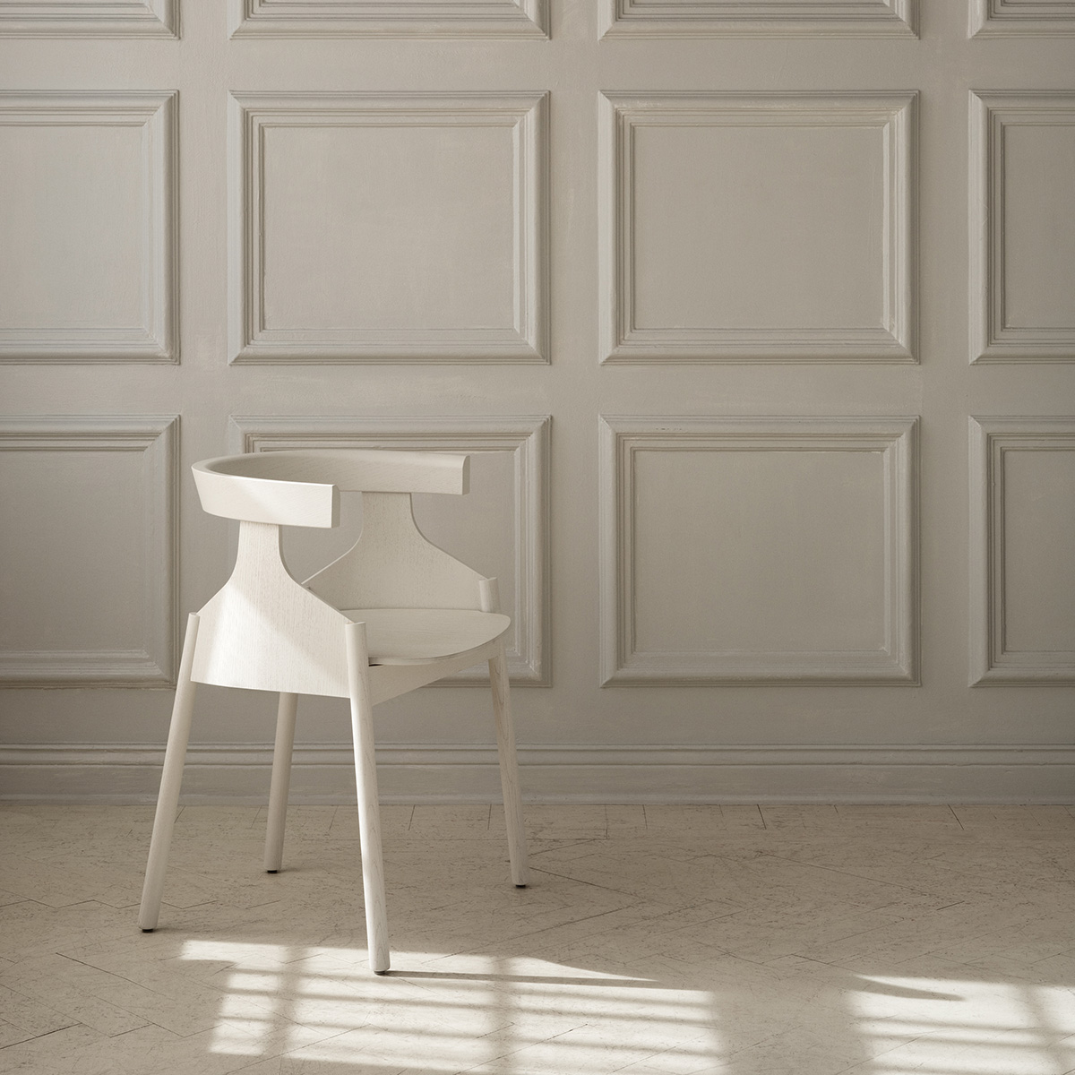 Howdoyoudo chair positioned in modern boardroom setting showcasing professional furniture application