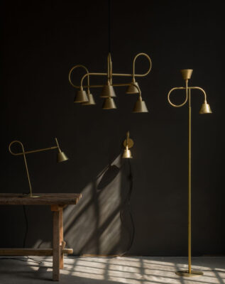 LOOP Family raw brass lighting collection by Jesper Ståhl for Konsthantverk Tyringe shown in modern interior