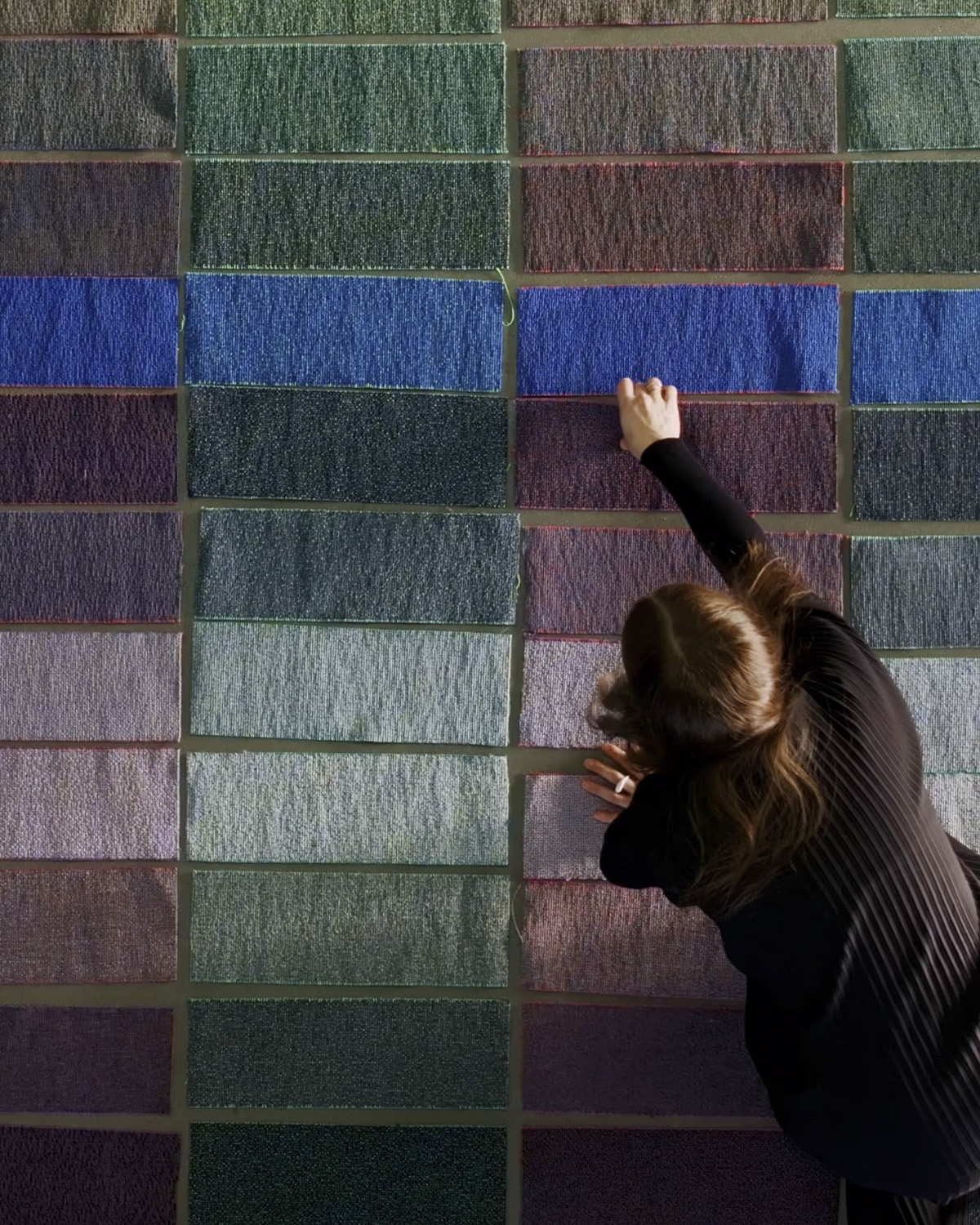 MATTER carpet collection overview by Snøhetta and Ege Carpets showing digital randomness pattern in studio lighting