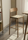 Betty bar and counter chairs by Jakob Thau Sami Kallio showcasing oak wood finishes and upholstered seats