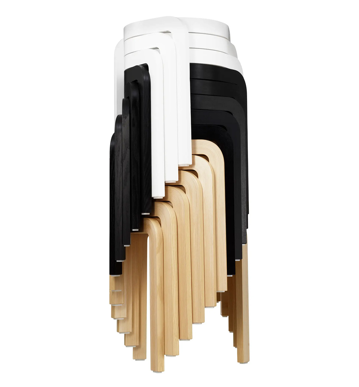 Multiple Spin stools by Staffan Holm stacked in spiral formation showing decorative storage feature