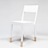 TS Chair by Thomas Sandell for Asplund featuring distinctive white finish with natural wood leg detail