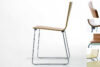 TORRO stackable chair by Jonas Lindvall for Skandiform featuring chrome metal runners and birch wood seat