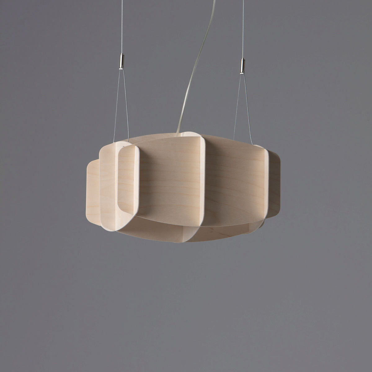 Side profile view of Ristikko architectural pendant lamp highlighting geometric birch construction