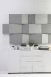 Triline wall panels by Anya Sebton for Abstracta showing triangular acoustic design in modern office setting